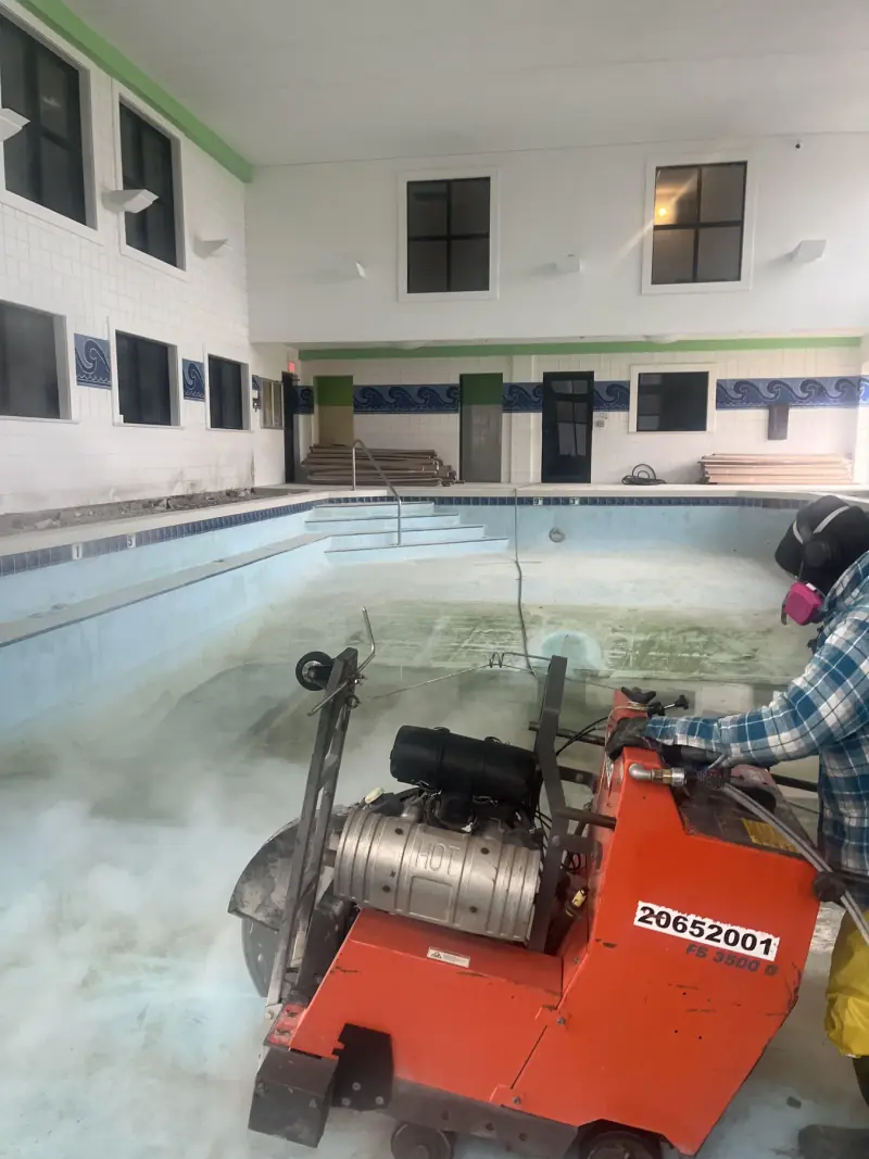 Indoor concrete pool before demolition